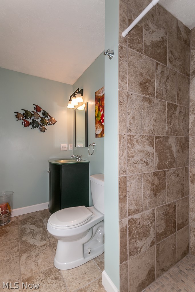 9089 Johnnycake Ridge Road Mentor, OH 44060 - Photo 17 of 34 Third full ensuite bath with ceramic walkin shower, custom vanity