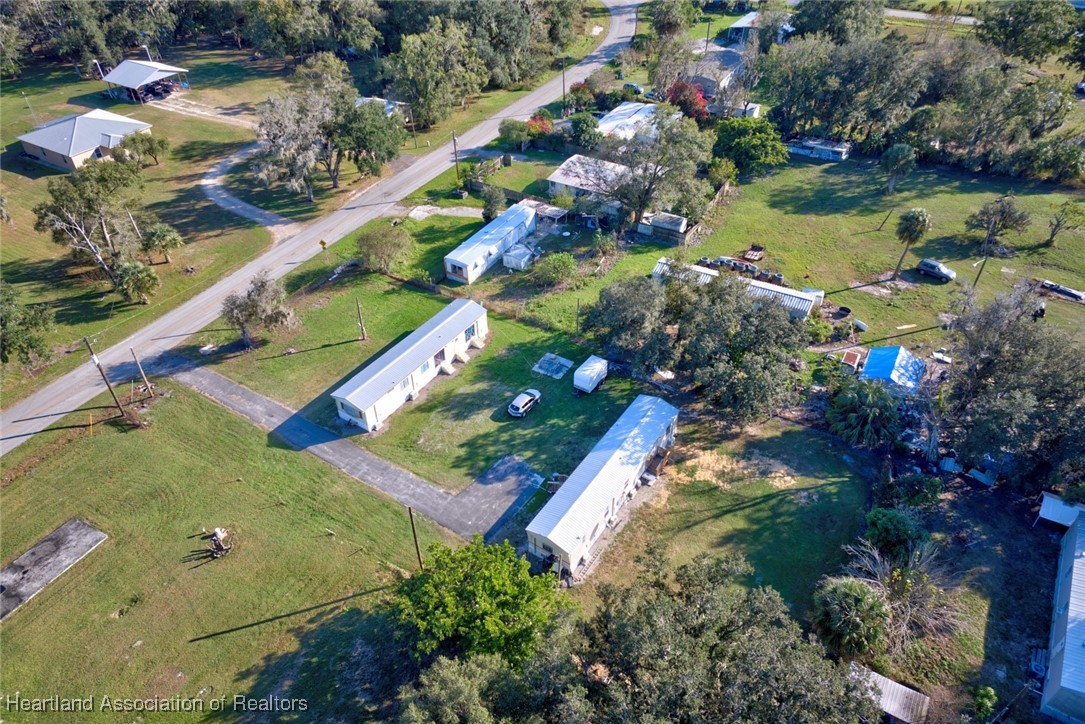 258-264 Griffin Road Wauchula, FL 33873 - Photo 33 of 33 an aerial view of a residential houses with outdoor space and city view