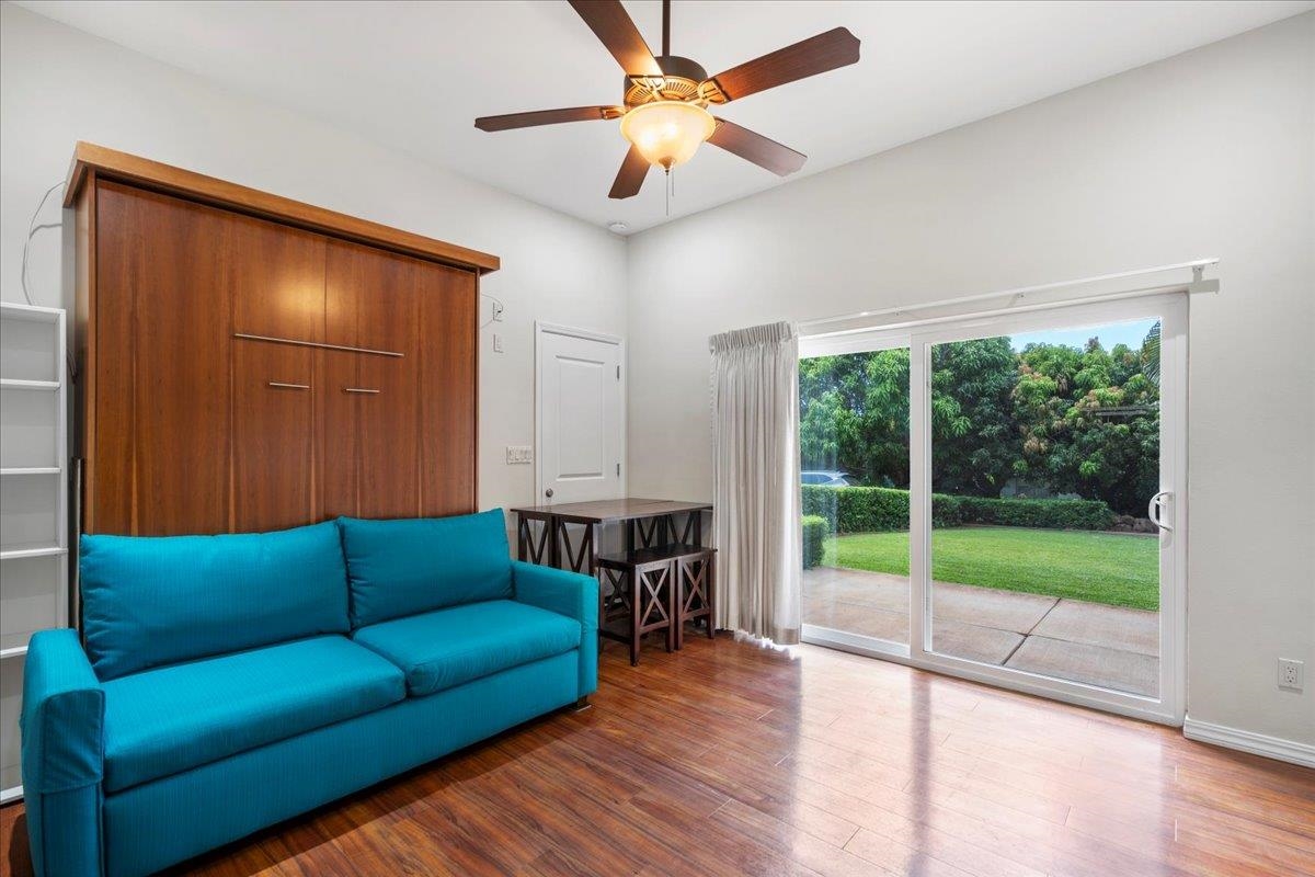 265 Kenolio Road Kihei, HI 96753 - Photo 16 of 50 a living room with furniture and a window