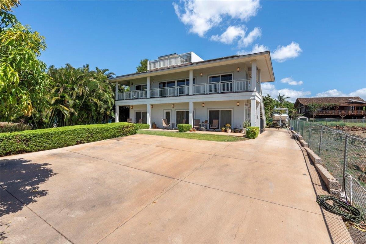 265 Kenolio Road Kihei, HI 96753 - Photo 21 of 50 a front view of house with yard