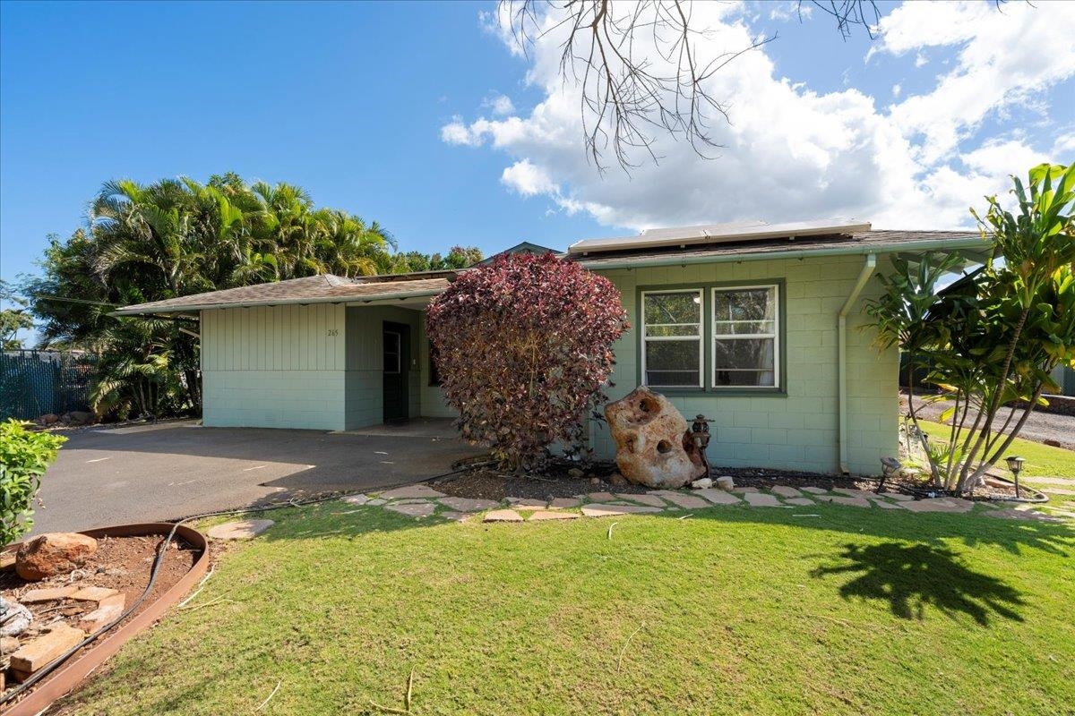 265 Kenolio Road Kihei, HI 96753 - Photo 36 of 50 a view of a house with a yard and tree s