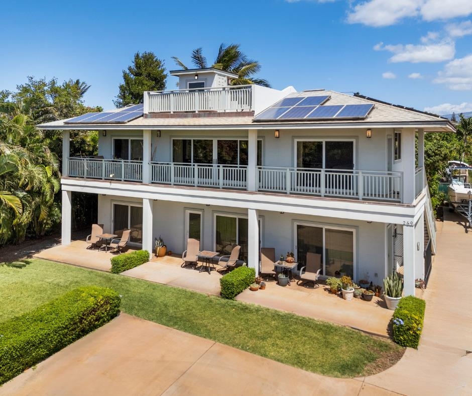 265 Kenolio Road Kihei, HI 96753 - Photo 5 of 50 a view of a house with a yard porch and sitting area