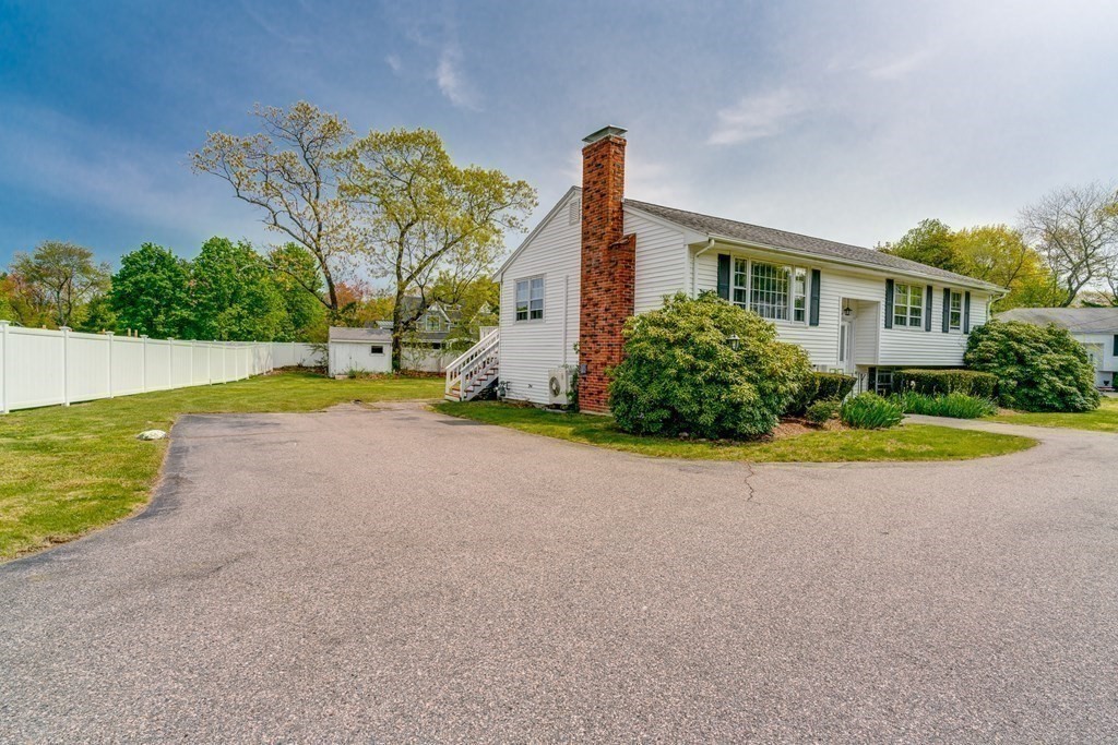 47 Kenney Street Canton, MA 02021 - Photo 7 of 8 a view of a house with pool and yard