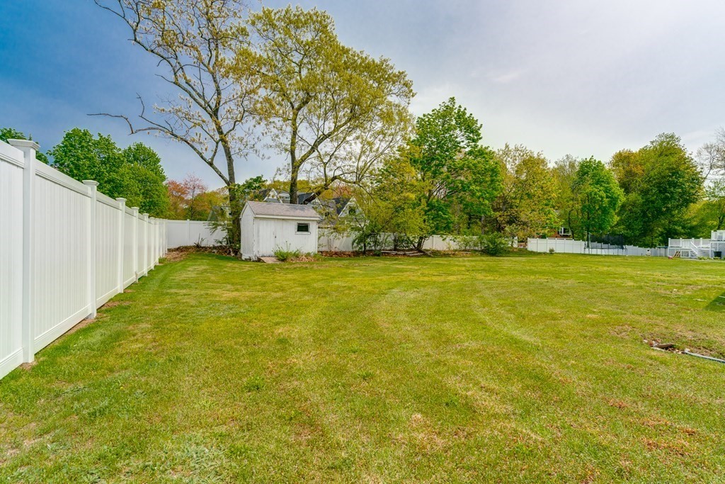 47 Kenney Street Canton, MA 02021 - Photo 8 of 8 a view of a yard with a house