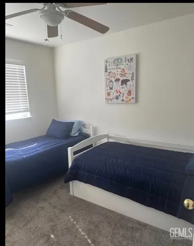 a room with a bed and couch