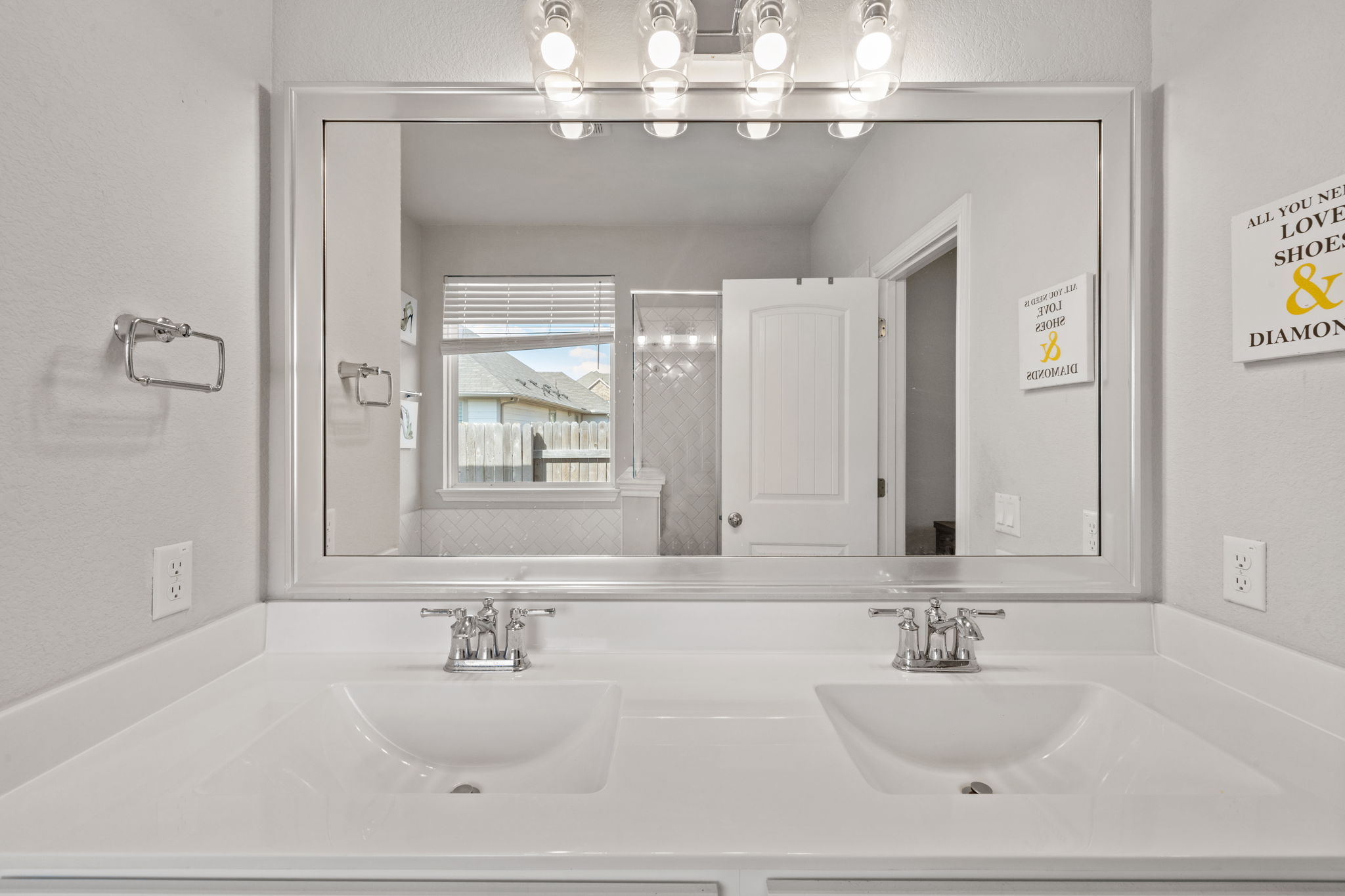 4009 Milano River Road Hutto, TX 78634 - Photo 21 of 39 Bathroom with double vanity