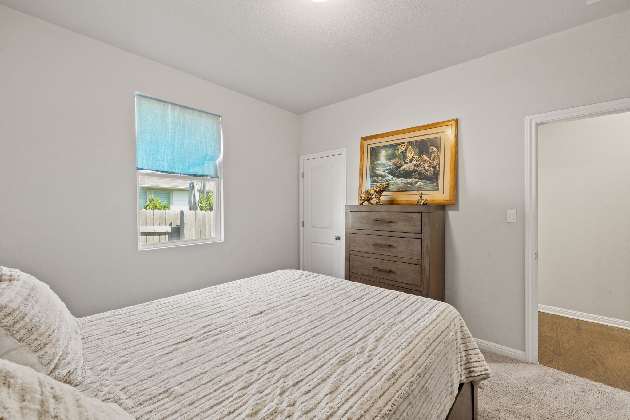 4009 Milano River Road Hutto, TX 78634 - Photo 26 of 39 Bedroom with baseboards and carpet flooring