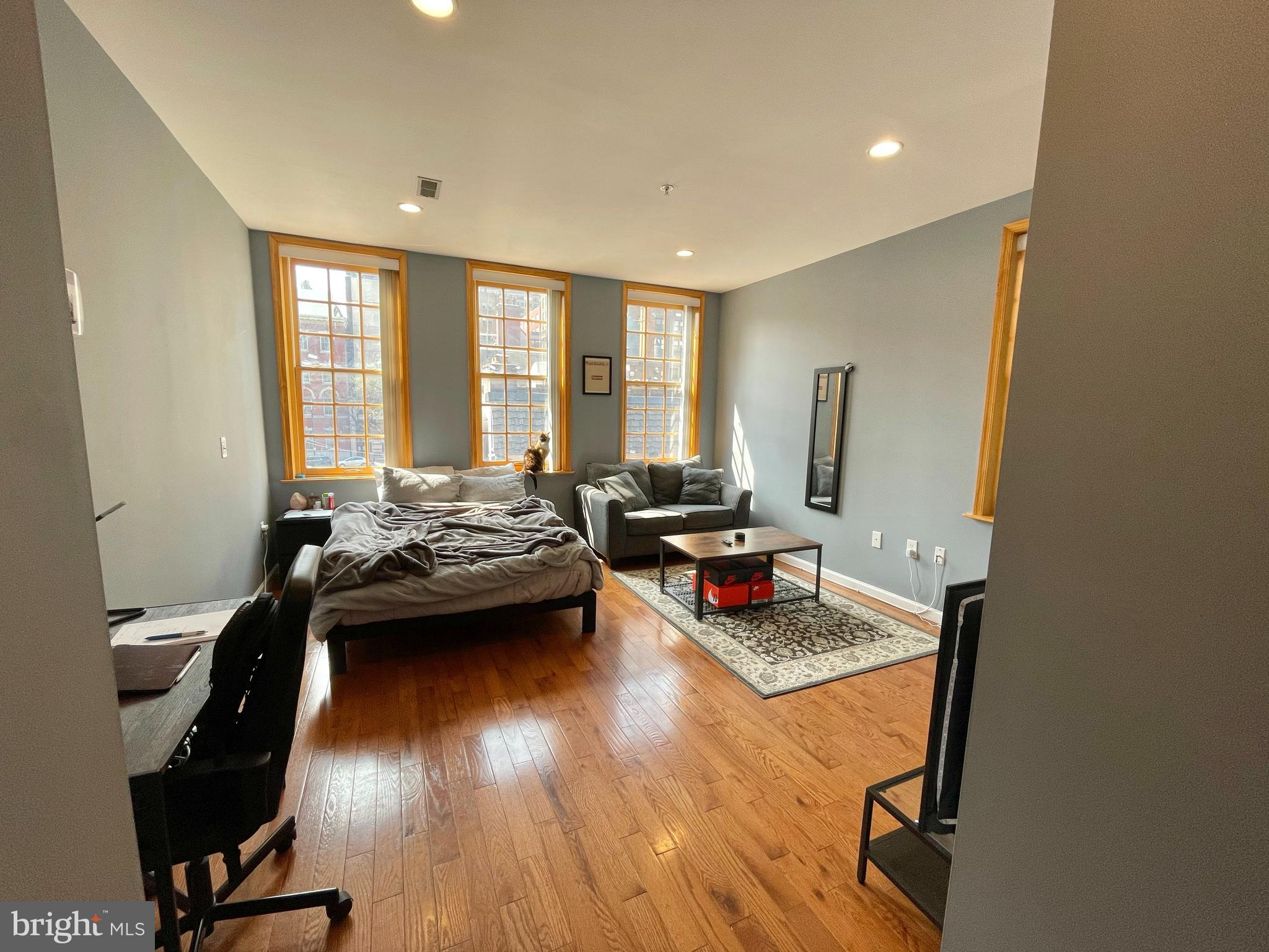 1316 Walnut Street, Unit 3R Philadelphia, PA 19107 - Photo 11 of 15 a view of a workspace with furniture and a window