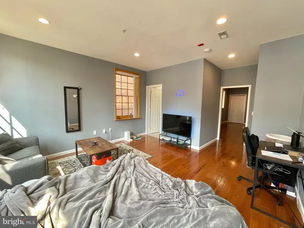 a bed room with a bed and a couch
