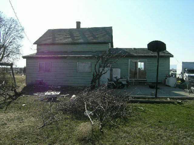 6550 Ashue Road Wapato, WA 98951 - Photo 3 of 3 a view of a house with a yard