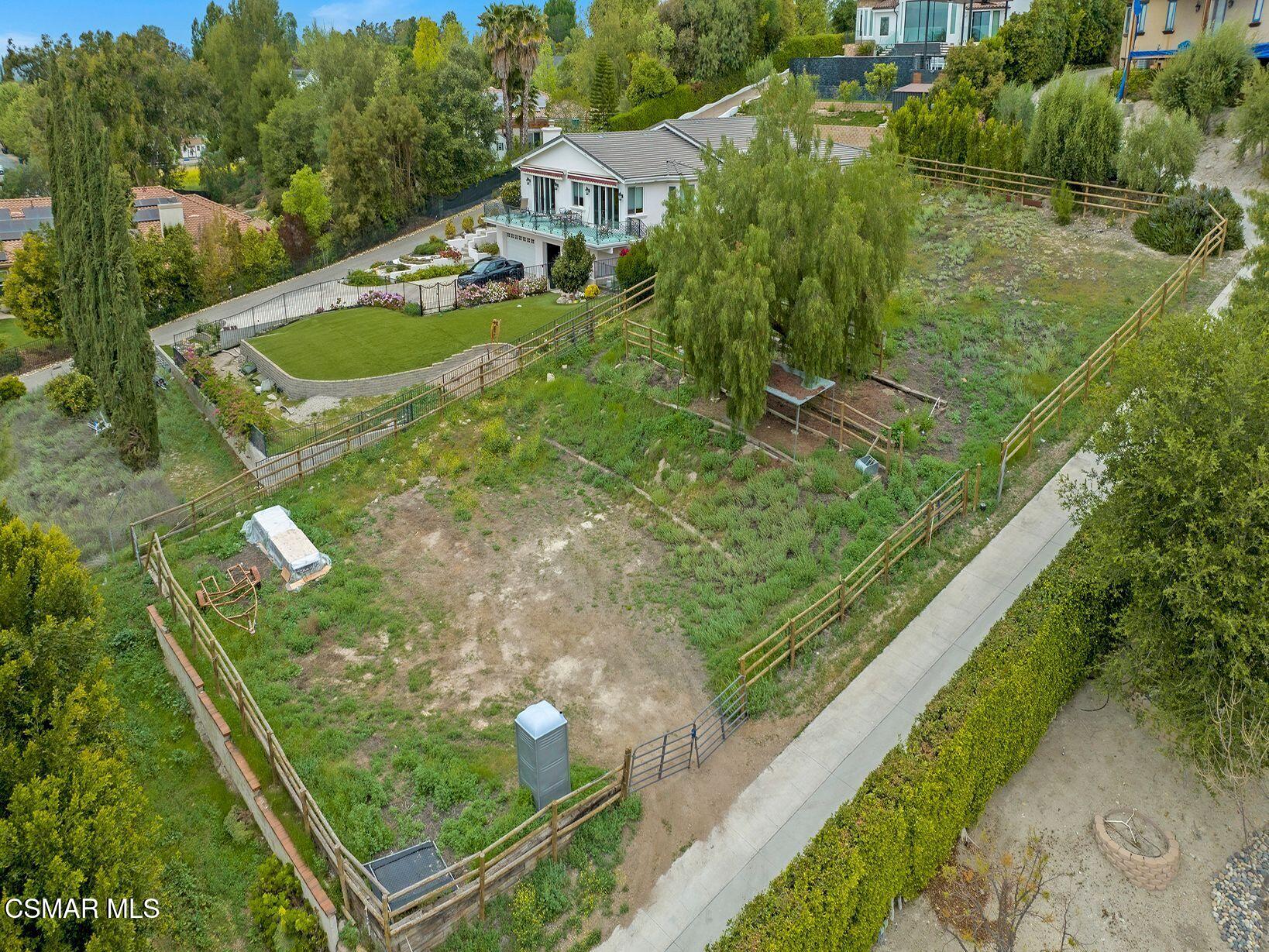 965 Rancho Road Thousand Oaks, CA 91362 - Photo 3 of 54 a aerial view of a house with pool