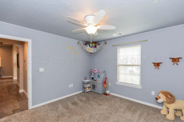 a workspace with furniture and window