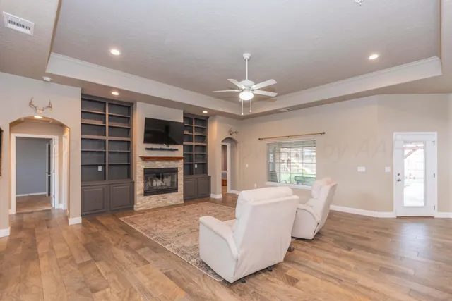 a view of a living room and chandelier
