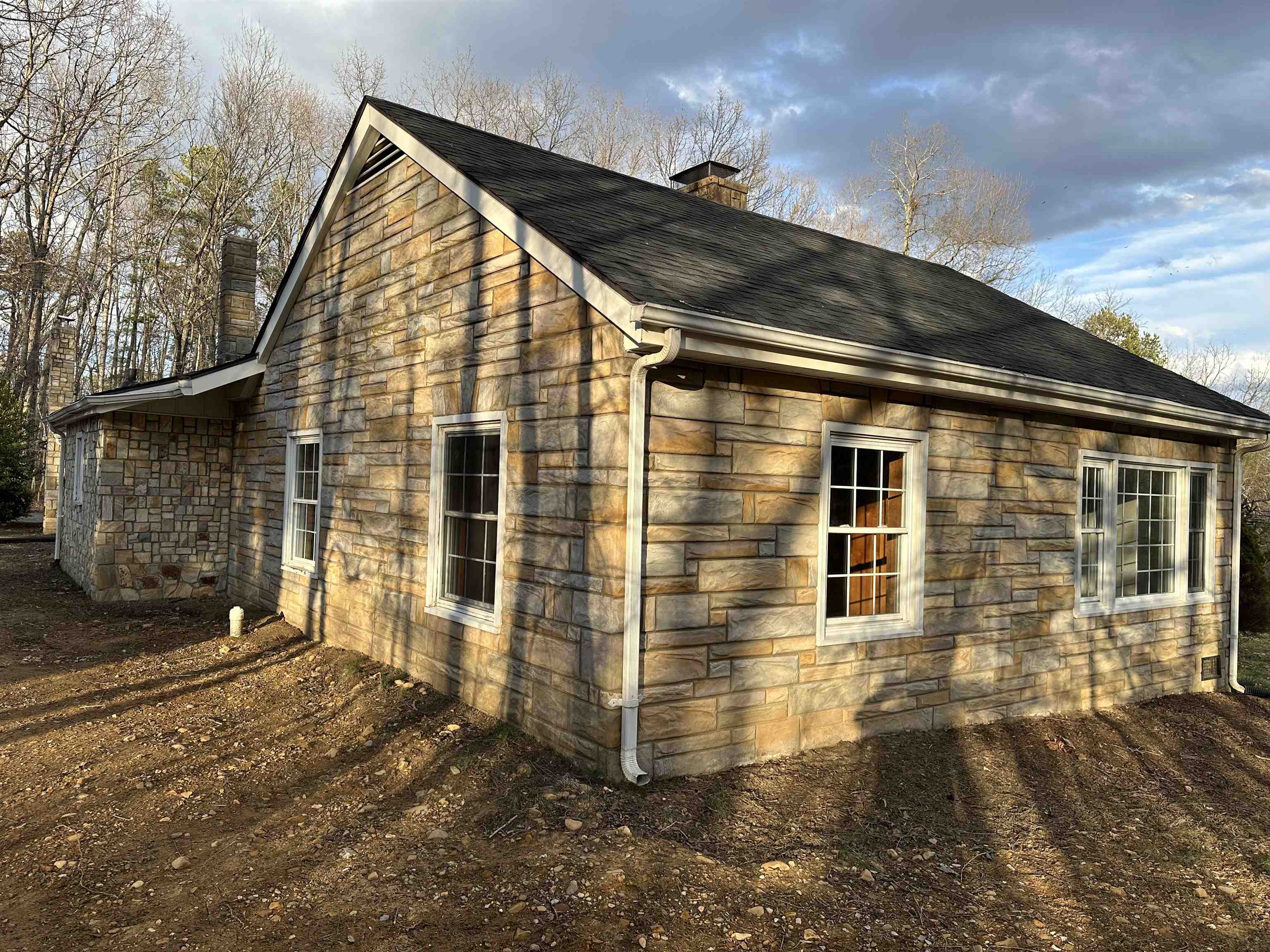 2205 Mt Torrey Road Lyndhurst, VA 22952 - Photo 15 of 43 a view of a brick house with many windows