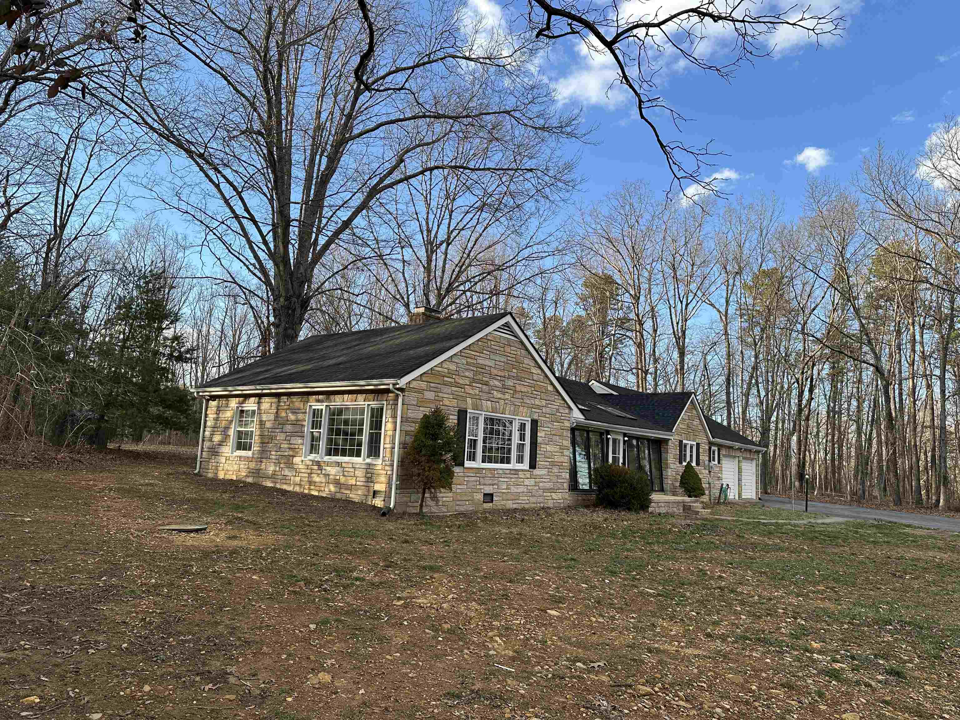 2205 Mt Torrey Road Lyndhurst, VA 22952 - Photo 17 of 43 a front view of a house with a garden and trees