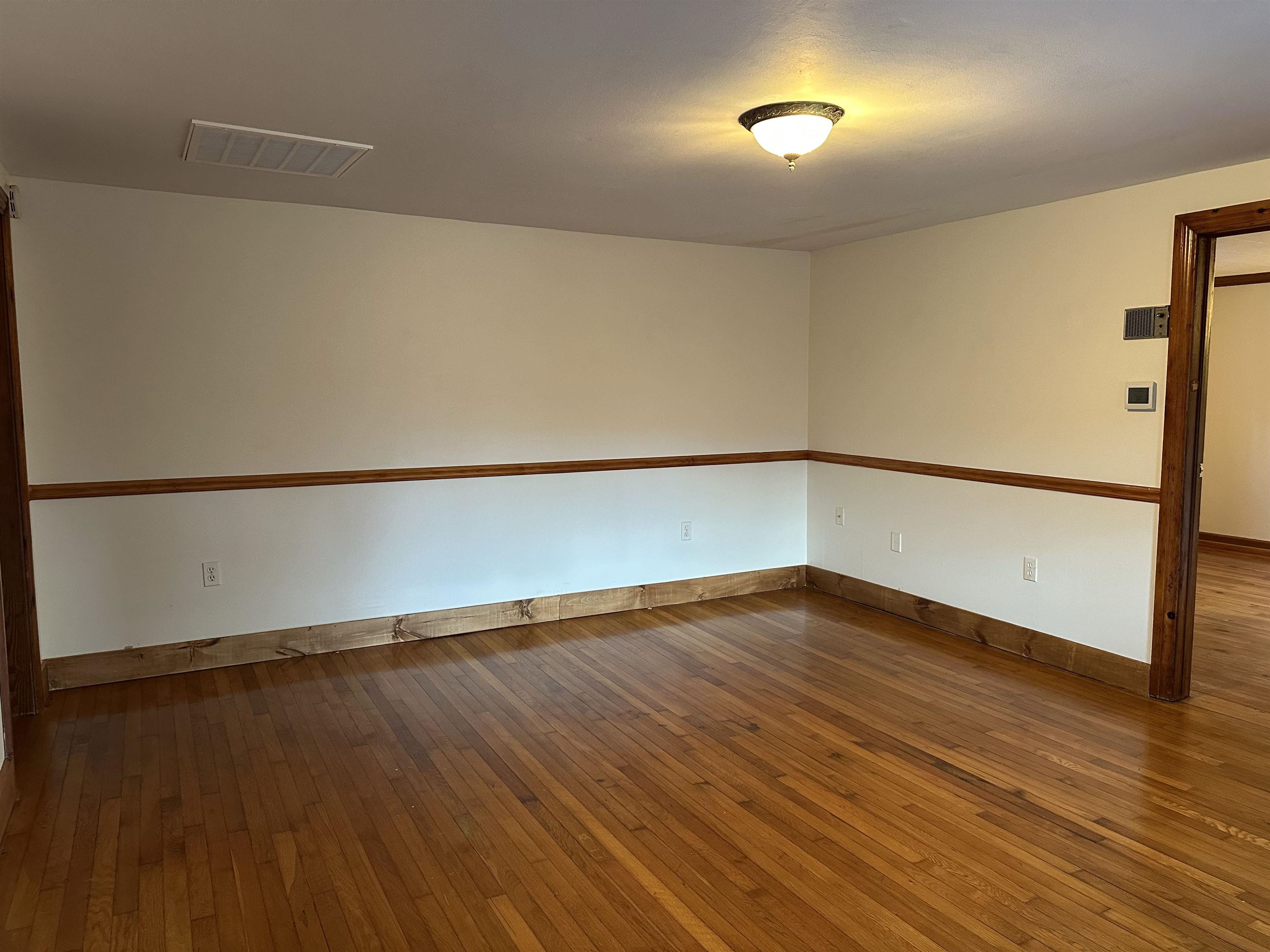 2205 Mt Torrey Road Lyndhurst, VA 22952 - Photo 28 of 43 a view of an empty room with wooden floor