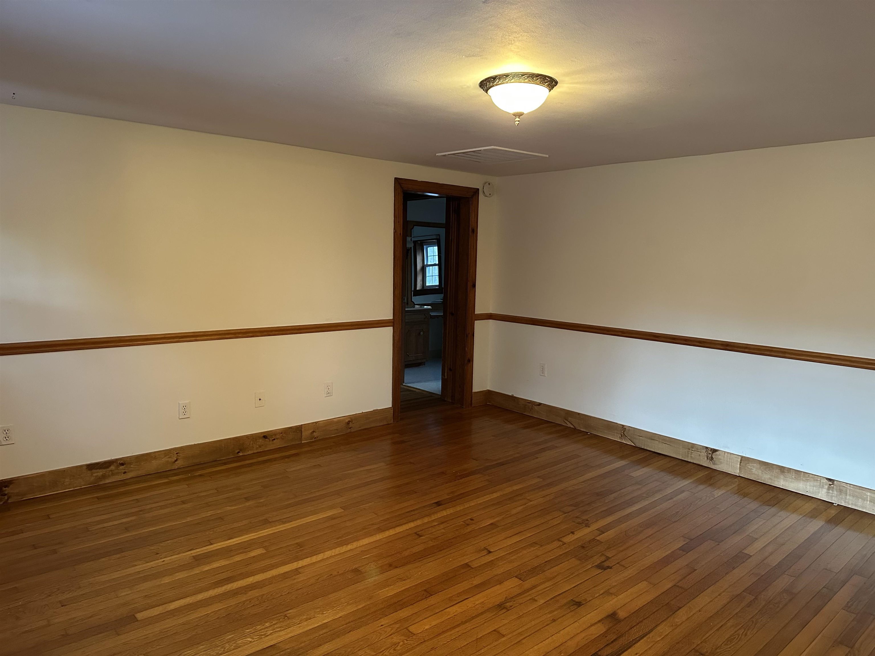 2205 Mt Torrey Road Lyndhurst, VA 22952 - Photo 29 of 43 a view of an empty room with wooden floor and a window