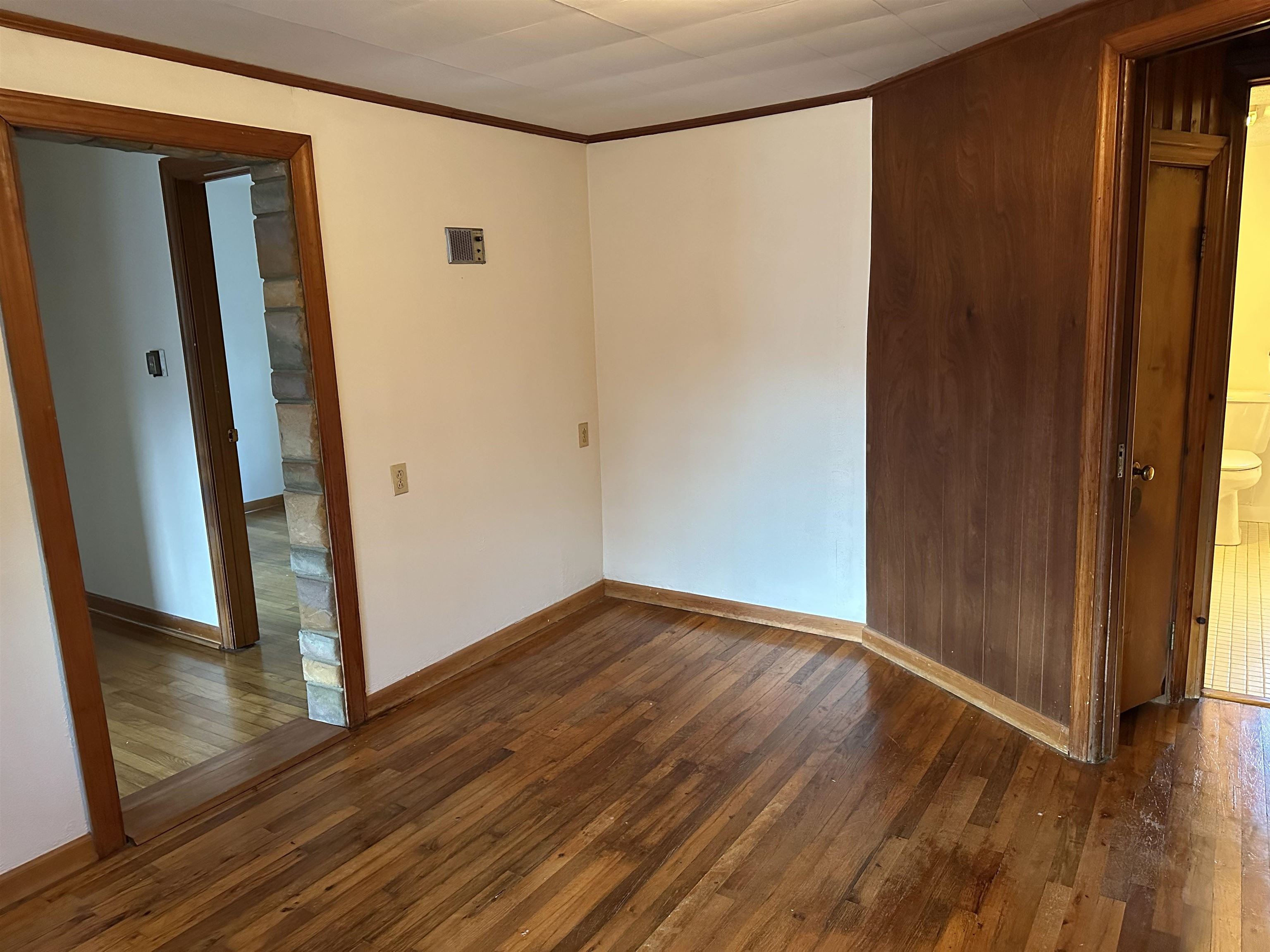 2205 Mt Torrey Road Lyndhurst, VA 22952 - Photo 35 of 43 an empty room with wooden floor and entrance