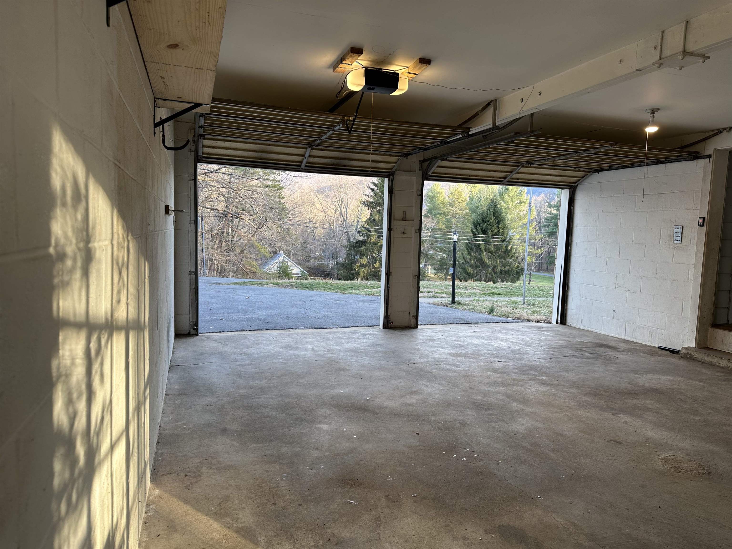 2205 Mt Torrey Road Lyndhurst, VA 22952 - Photo 42 of 43 a view of large parking space wooden floor and a fireplace