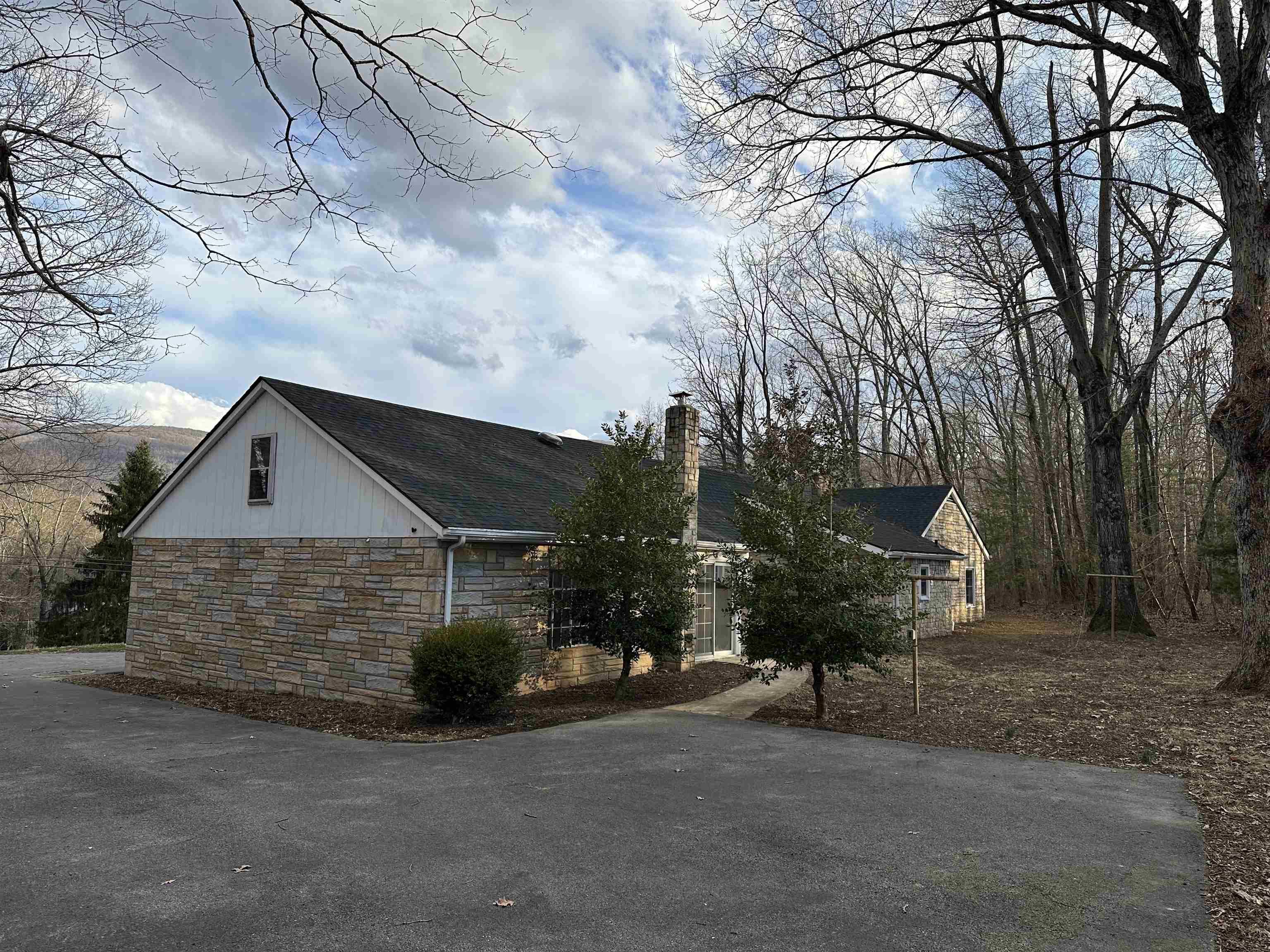 2205 Mt Torrey Road Lyndhurst, VA 22952 - Photo 8 of 43 a view of a house with a large tree and wooden fence