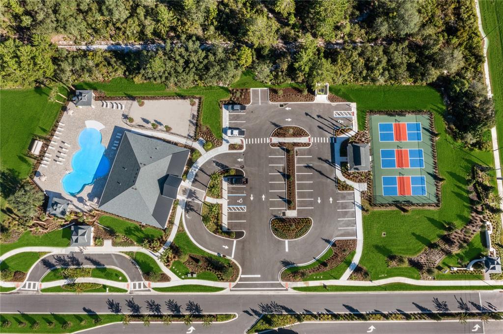 882 Liliana Drive Deland, FL 32724 - Photo 29 of 40 an aerial view of residential house with outdoor space and parking