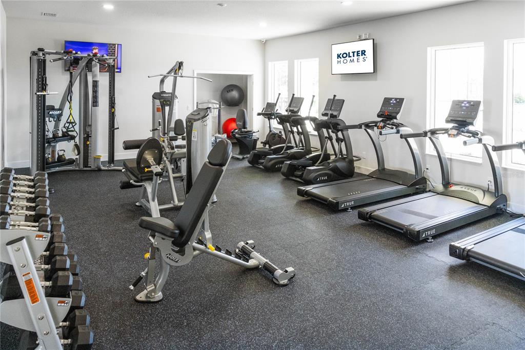 882 Liliana Drive Deland, FL 32724 - Photo 33 of 40 a view of a room with gym equipment