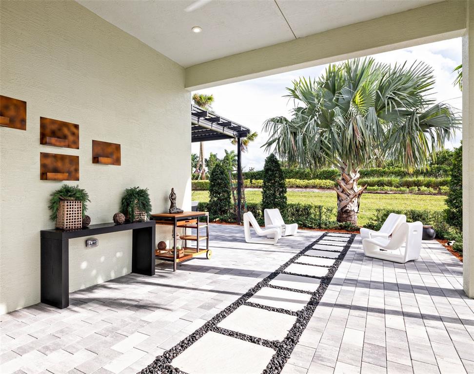 882 Liliana Drive Deland, FL 32724 - Photo 4 of 40 a living room with patio furniture