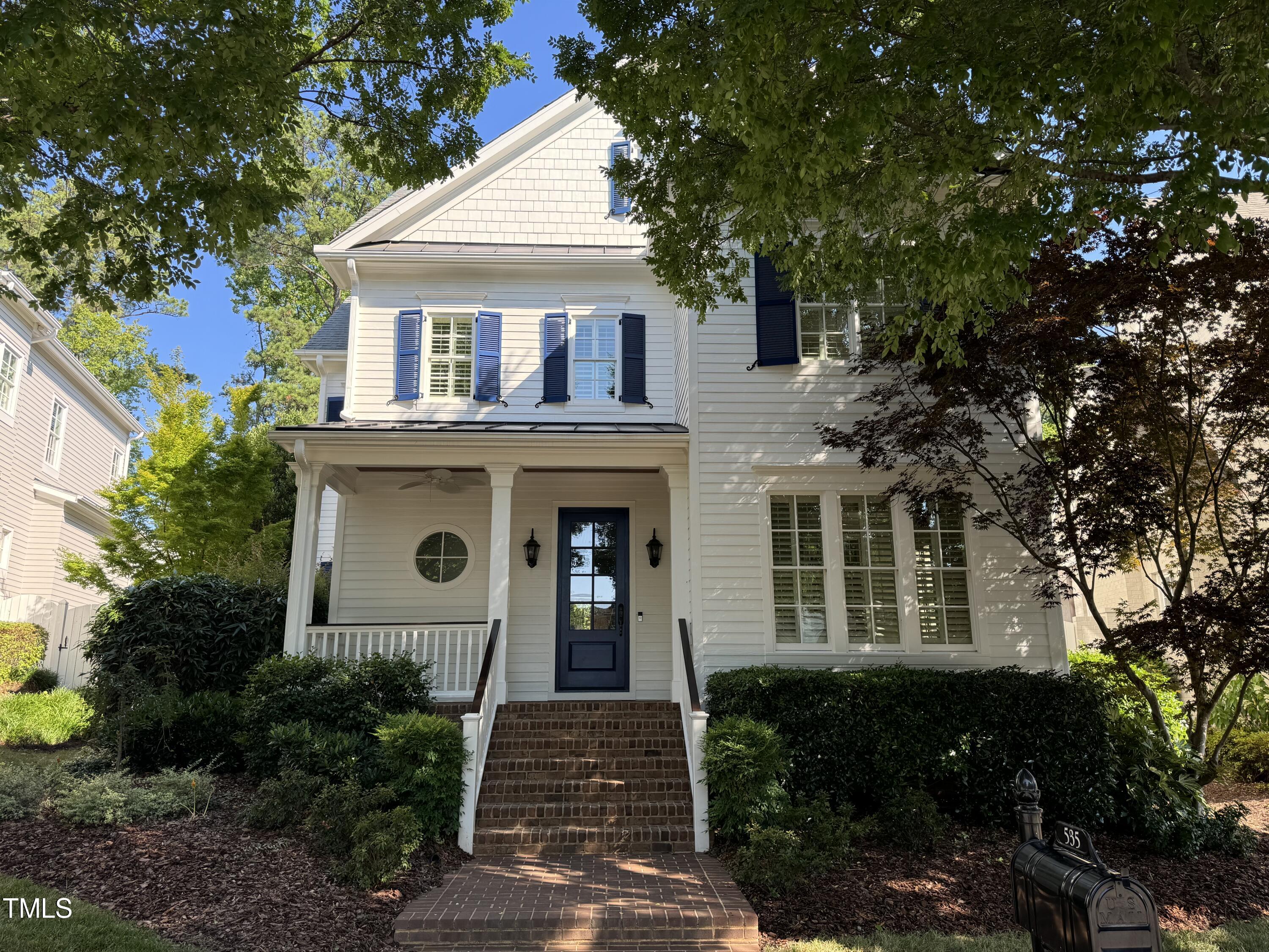 535 Guilford Circle Raleigh, NC 27608 - Photo 1 of 30 a front view of a house with yard
