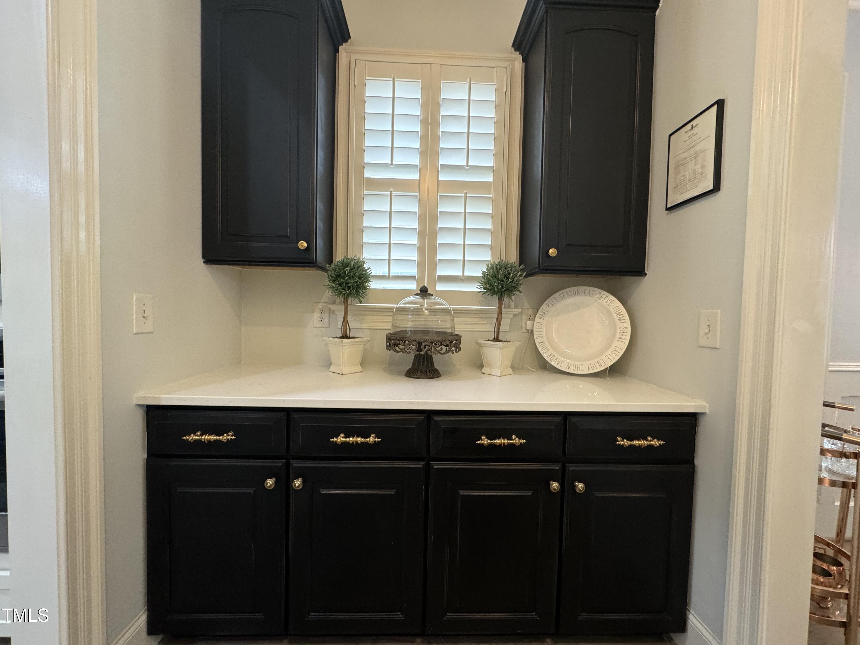 535 Guilford Circle Raleigh, NC 27608 - Photo 12 of 30 a bathroom with a sink vanity and a mirror