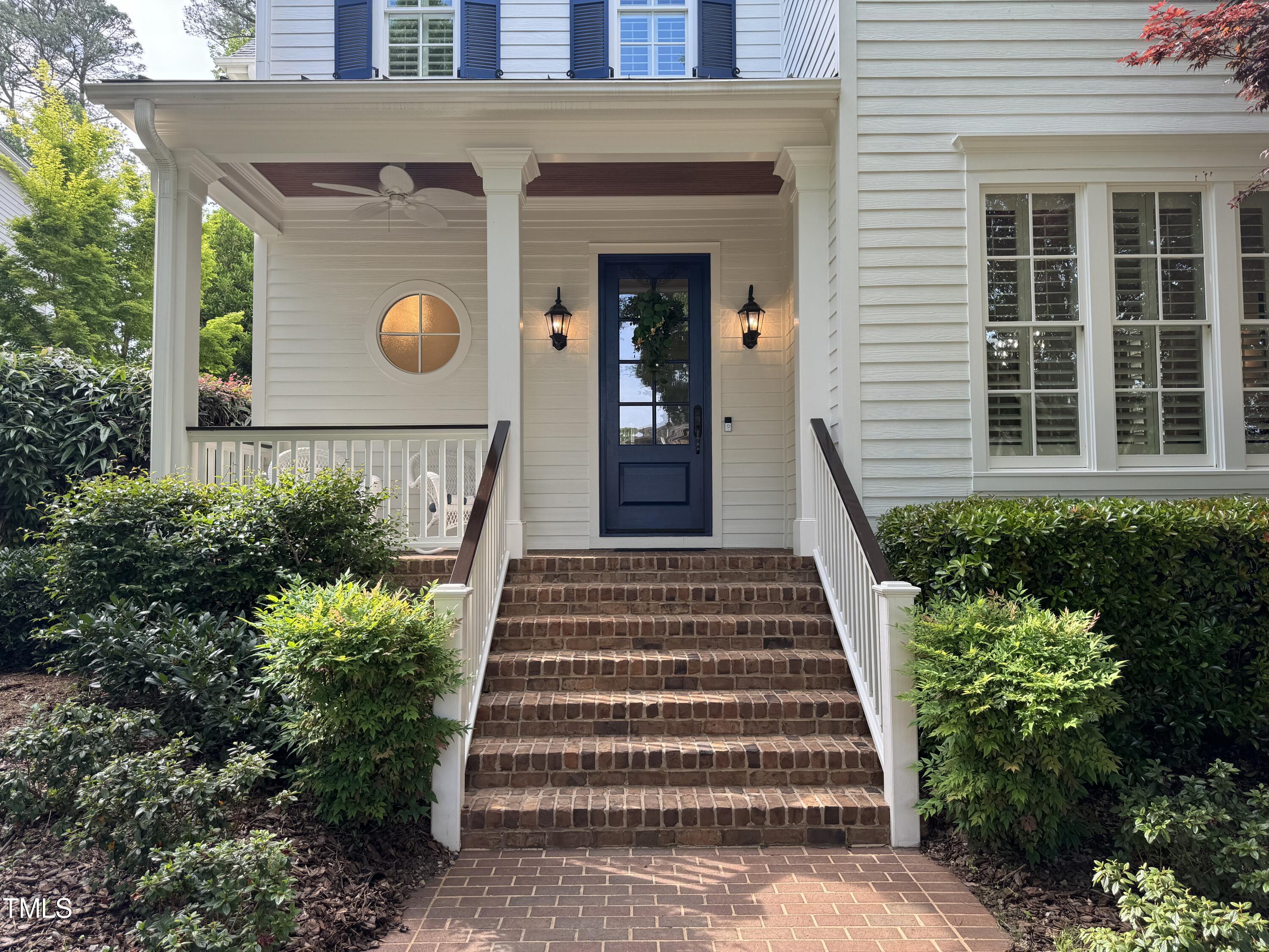 535 Guilford Circle Raleigh, NC 27608 - Photo 2 of 30 a front view of a house with a yard