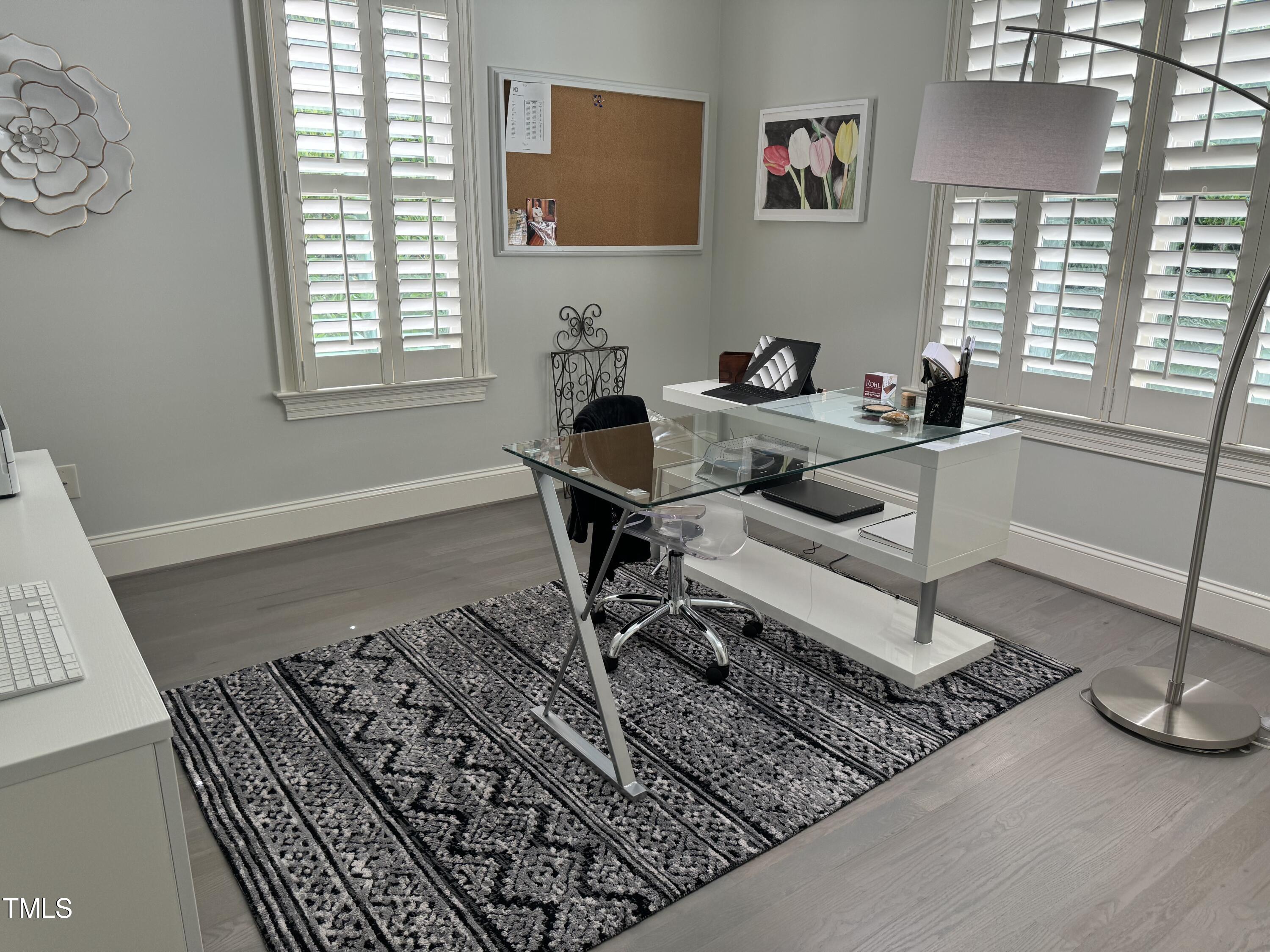 535 Guilford Circle Raleigh, NC 27608 - Photo 22 of 30 a workspace with furniture and window