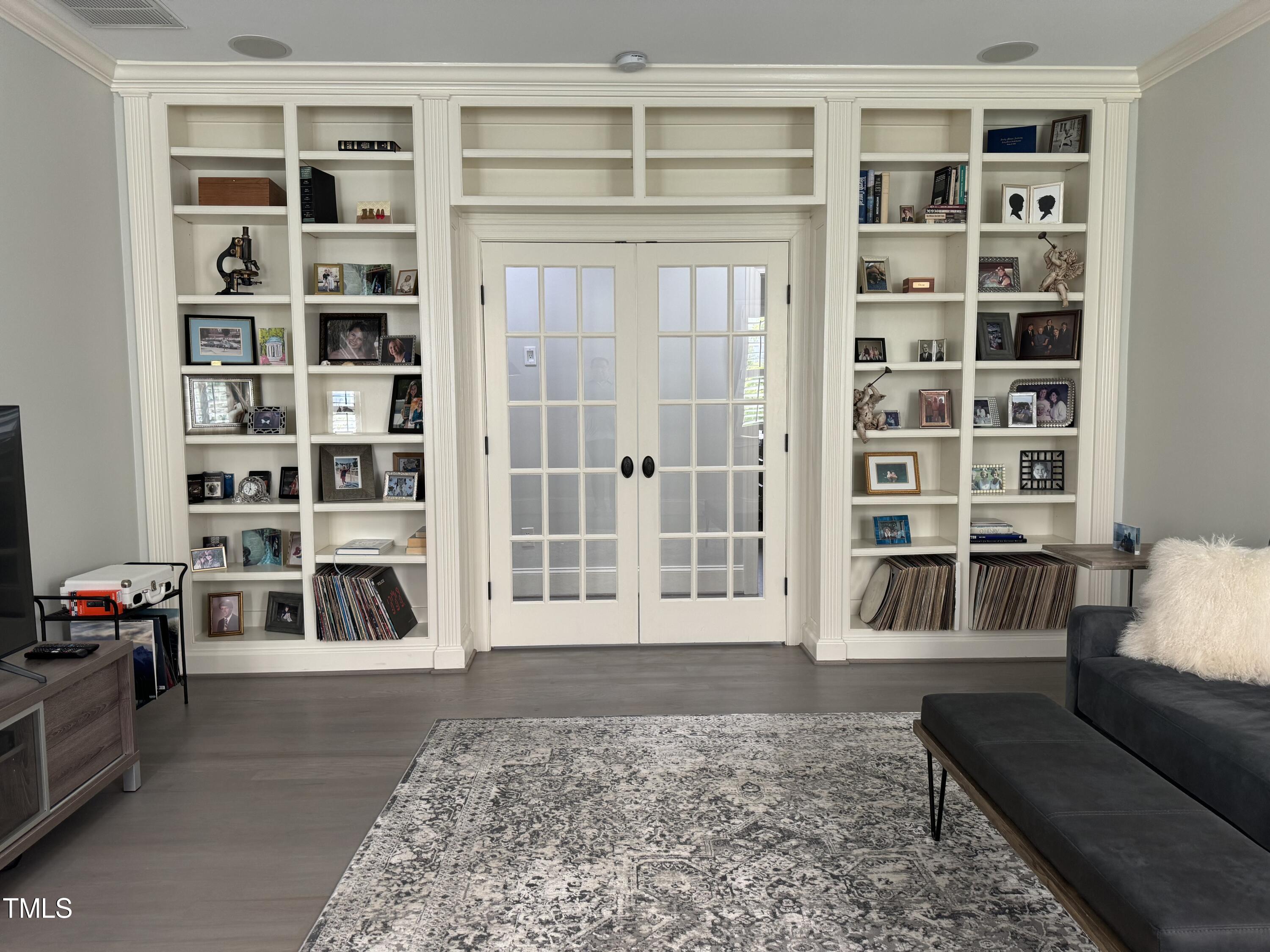 535 Guilford Circle Raleigh, NC 27608 - Photo 24 of 30 a living room with a couch and a window