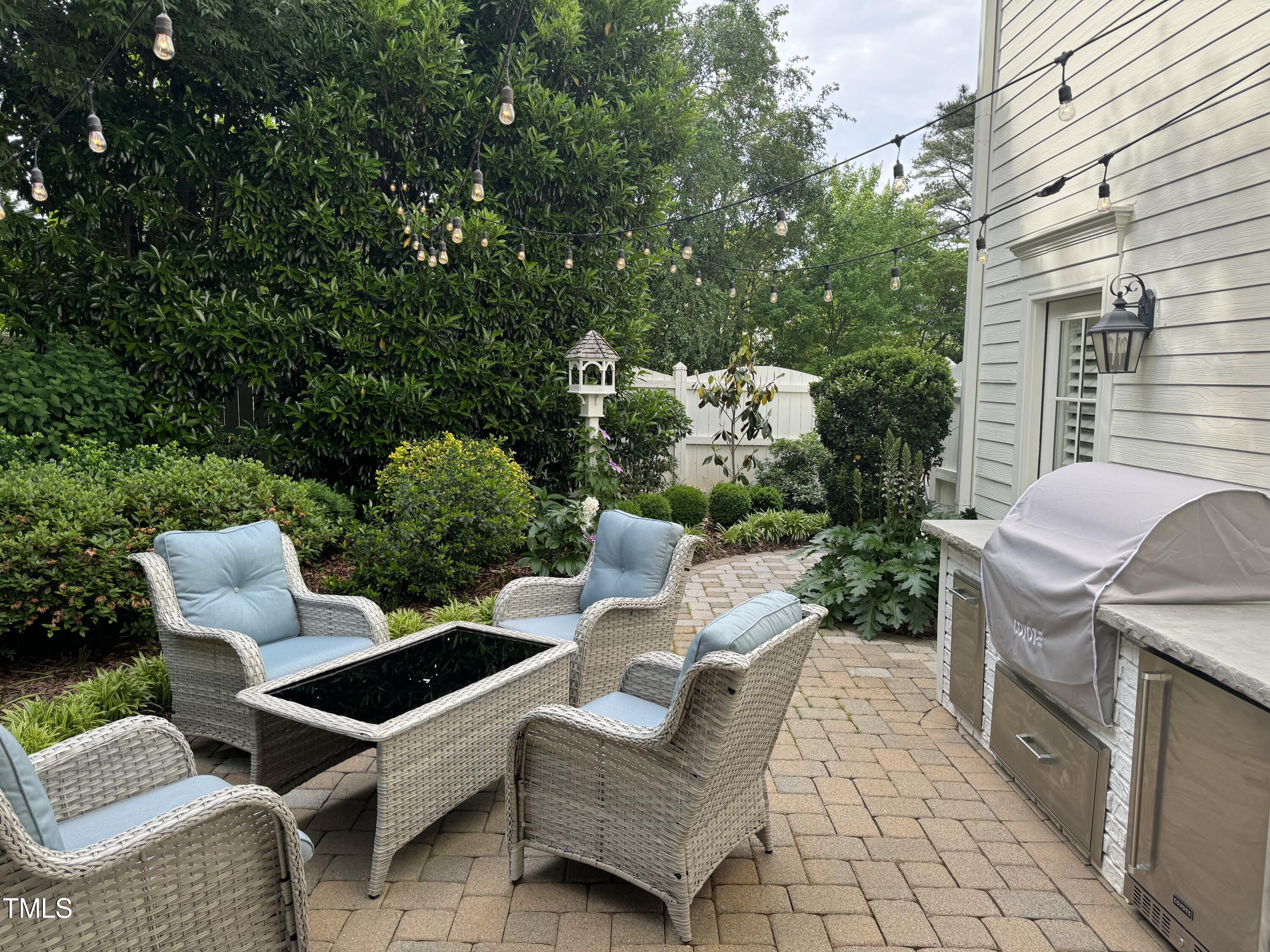 535 Guilford Circle Raleigh, NC 27608 - Photo 26 of 30 a view of a patio with couple of chairs