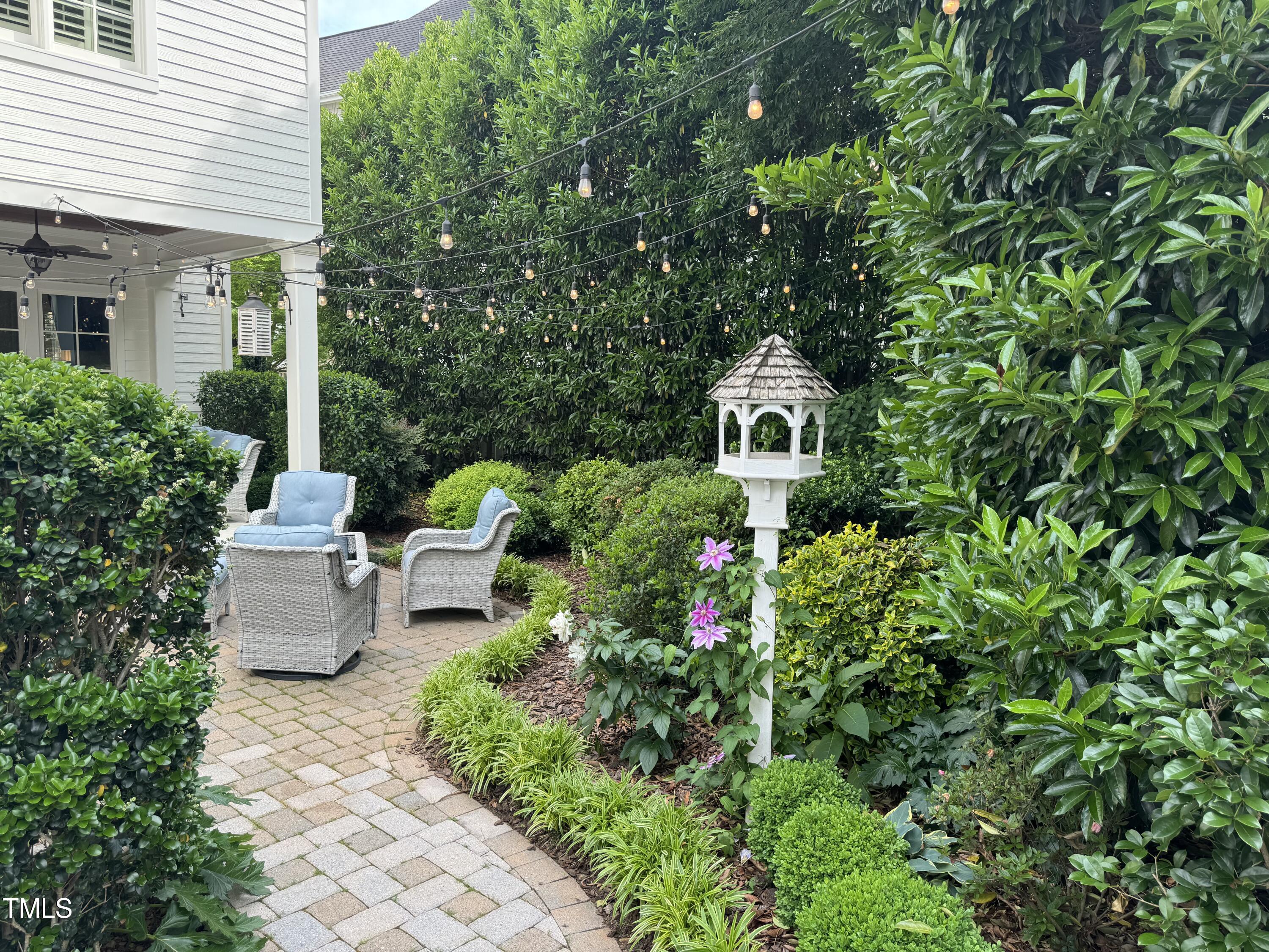 535 Guilford Circle Raleigh, NC 27608 - Photo 29 of 30 a front view of a house with fountain and porch