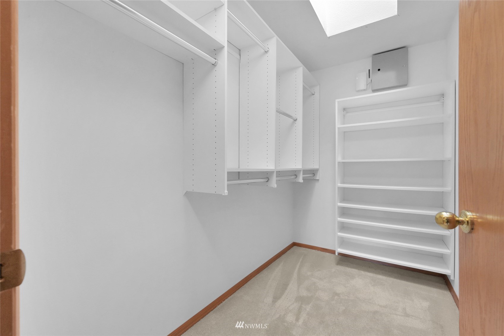 18203 Bellflower Road Bothell, WA 98012 - Photo 24 of 37 a view of walk in closet with empty racks