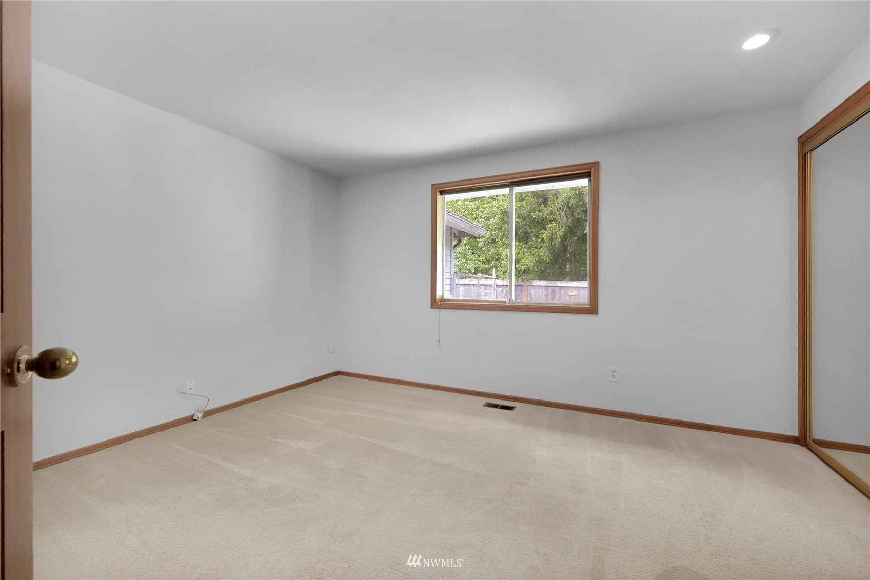 18203 Bellflower Road Bothell, WA 98012 - Photo 26 of 37 an empty room with a window