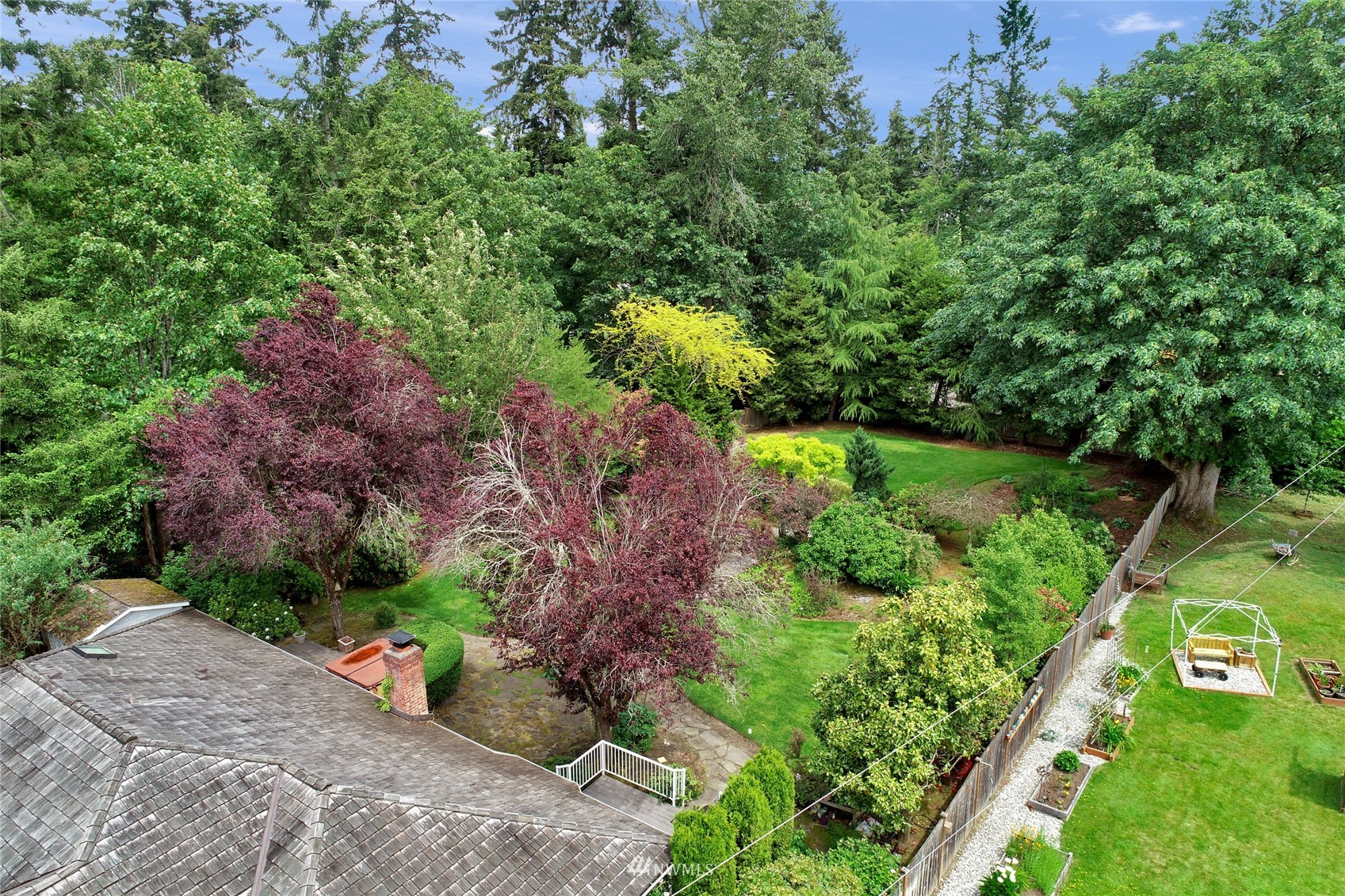 18203 Bellflower Road Bothell, WA 98012 - Photo 35 of 37 a view of a garden with plants