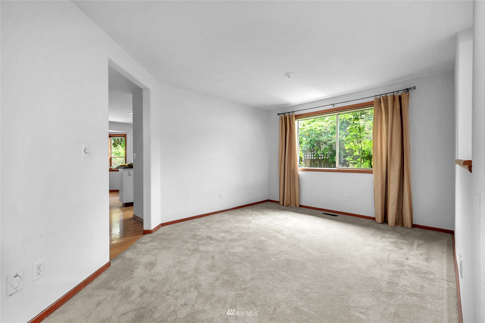 18203 Bellflower Road Bothell, WA 98012 - Photo 10 of 37 an empty room with windows