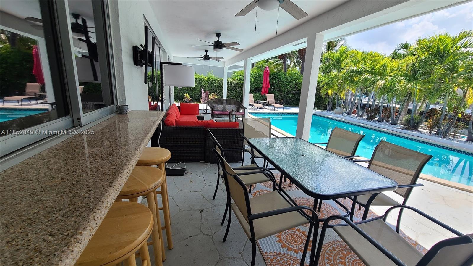 4211 Northeast 25th Avenue Lighthouse Point, FL 33064 - Photo 17 of 29 a outdoor space with chairs