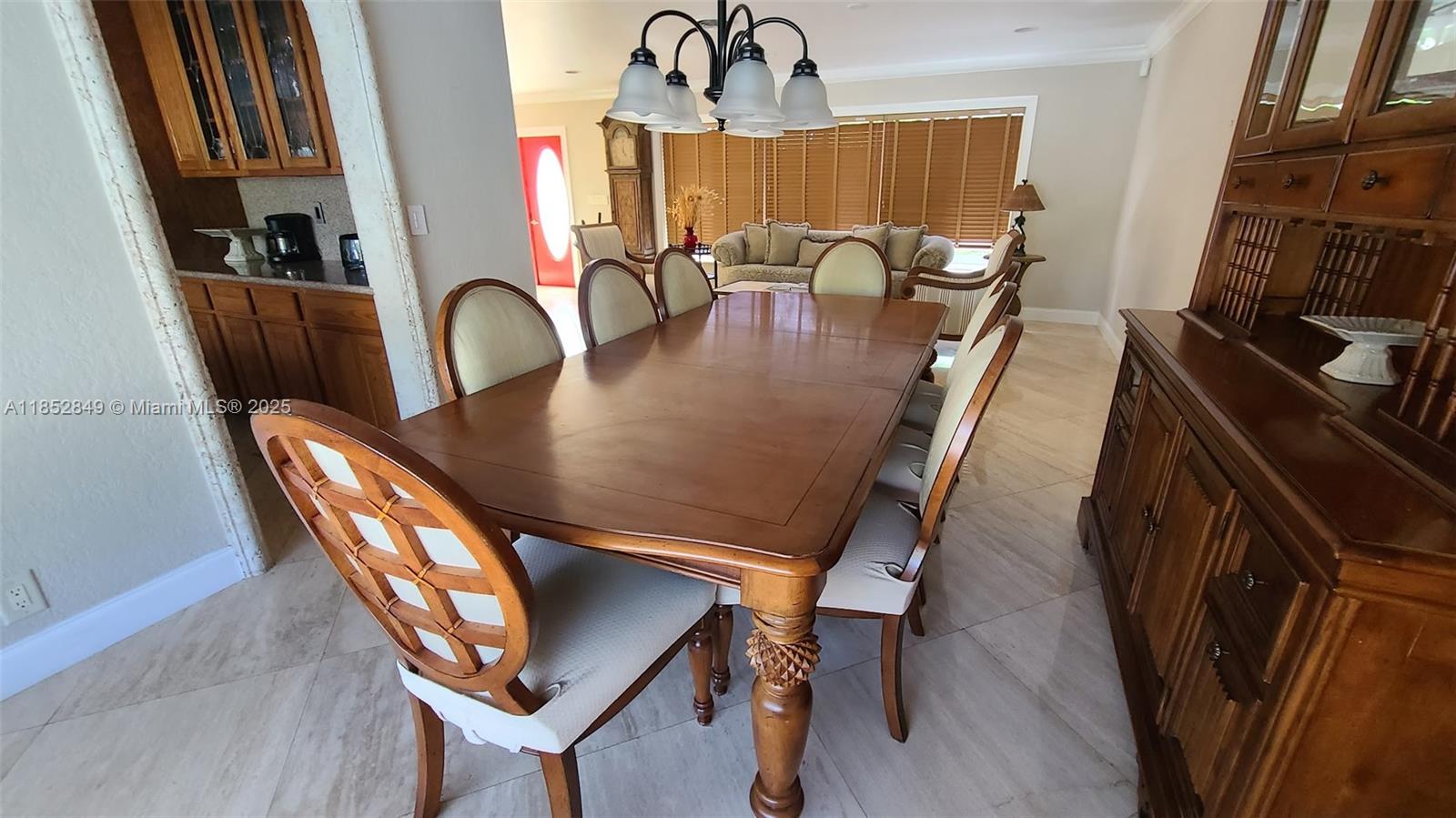 4211 Northeast 25th Avenue Lighthouse Point, FL 33064 - Photo 25 of 29 a view of a dining room with furniture and window