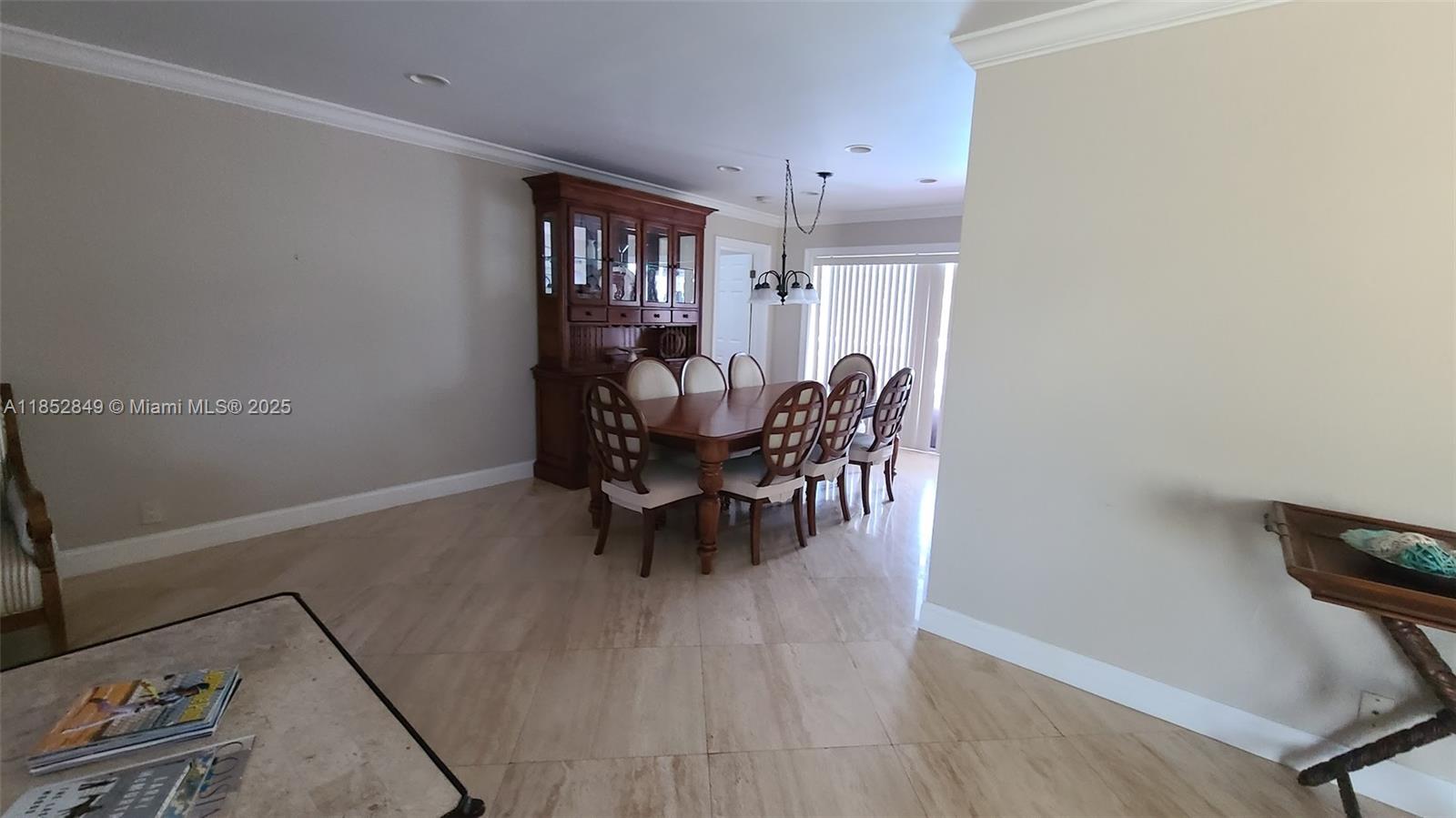 4211 Northeast 25th Avenue Lighthouse Point, FL 33064 - Photo 5 of 29 a workspace with furniture window and wooden floor