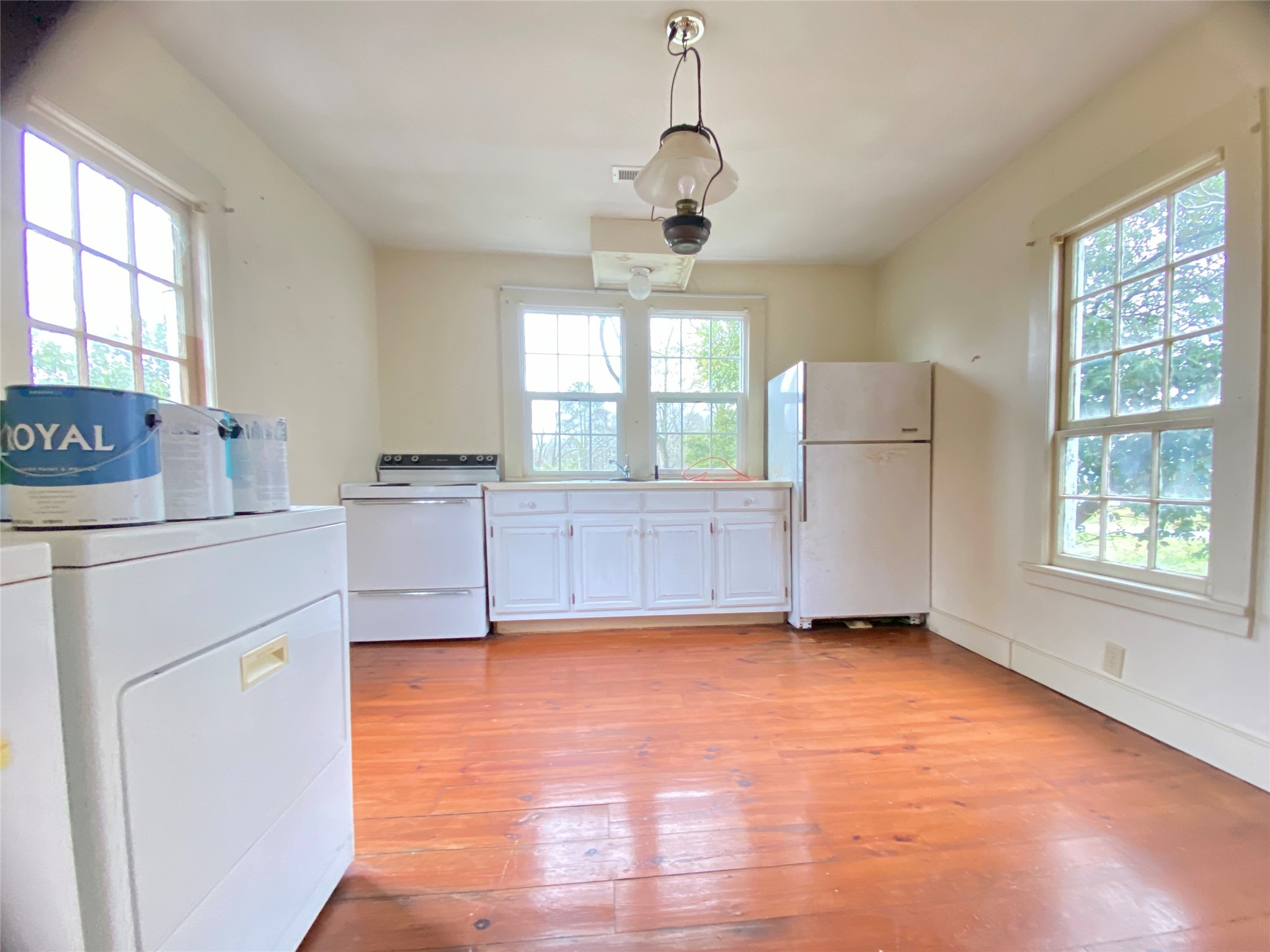 108 West Liberty Street Washington, GA 30673 - Photo 17 of 24 a view of a kitchen with microwave and windows
