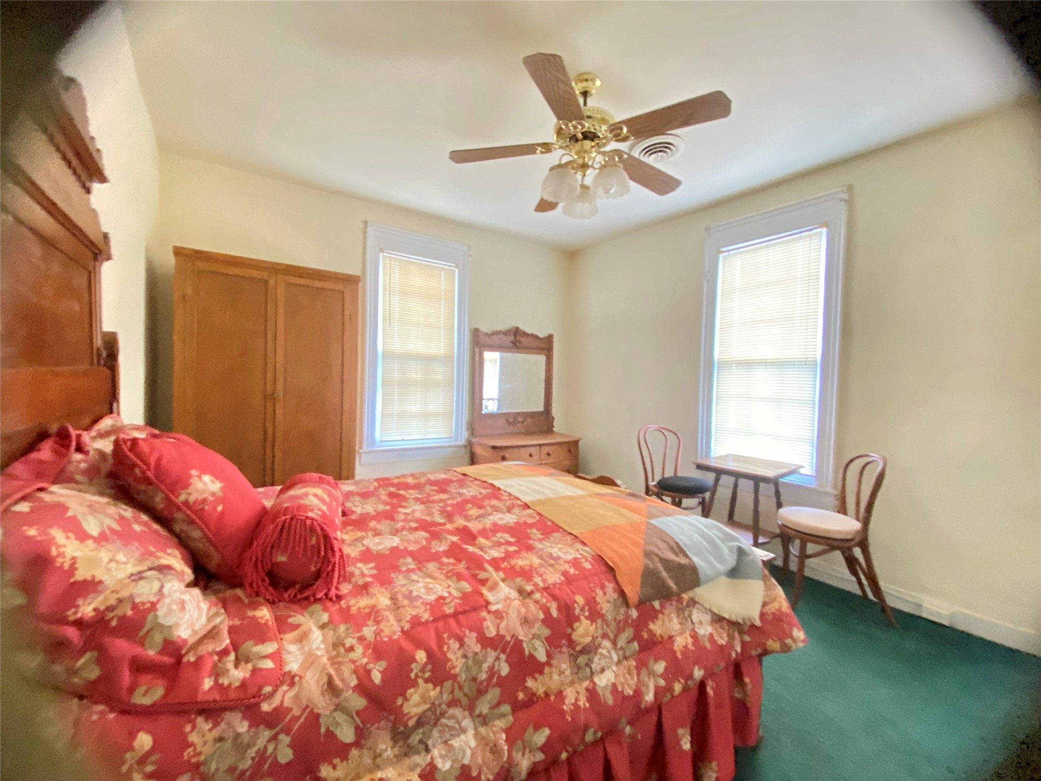 108 West Liberty Street Washington, GA 30673 - Photo 18 of 24 a bedroom with a bed and window