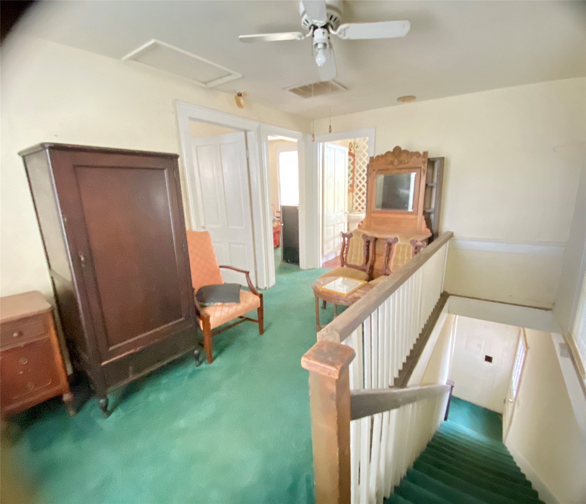 108 West Liberty Street Washington, GA 30673 - Photo 19 of 24 a living room with a baby crib furniture and a window