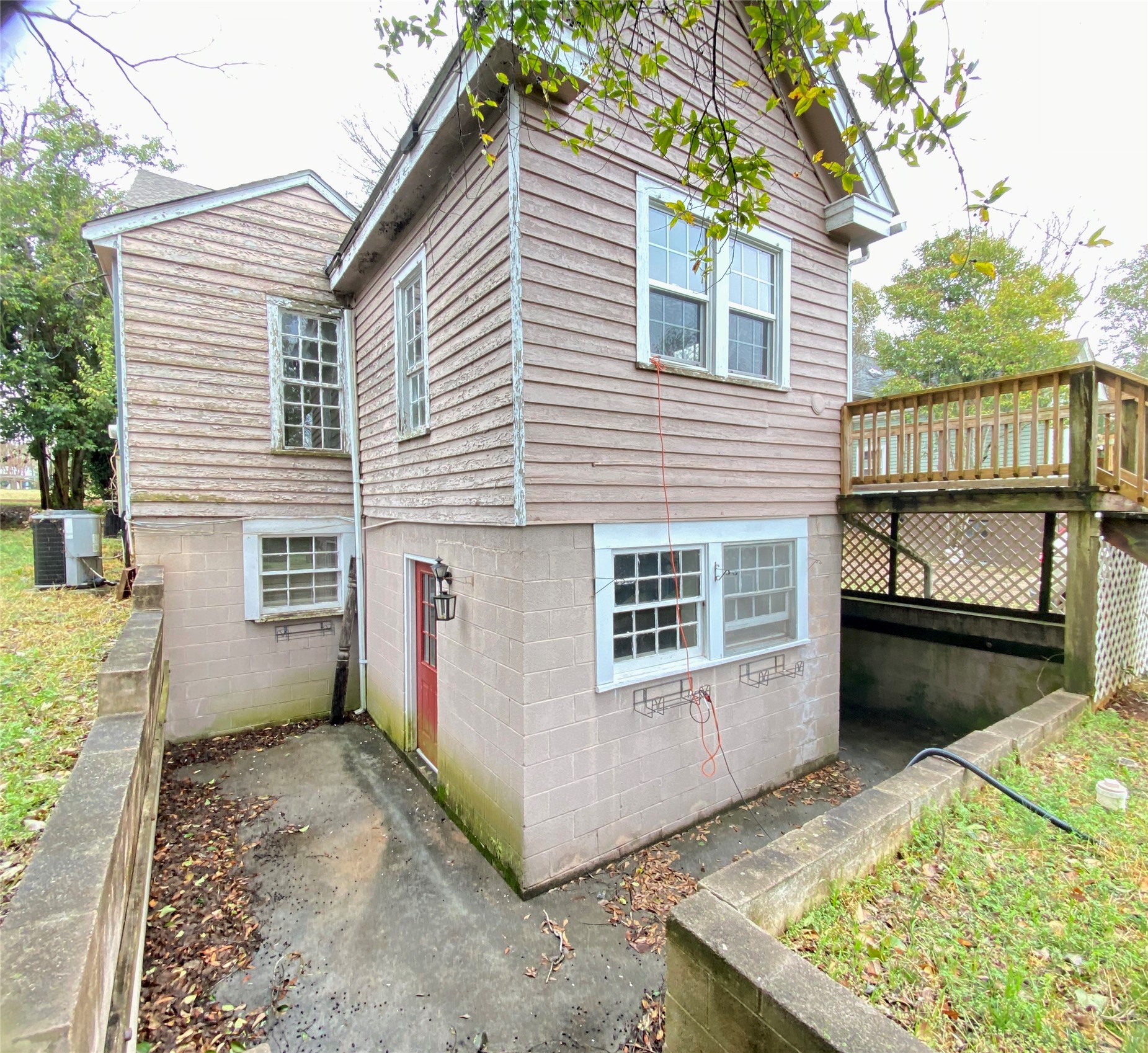 108 West Liberty Street Washington, GA 30673 - Photo 21 of 24 a view of a house with a yard and wooden fence