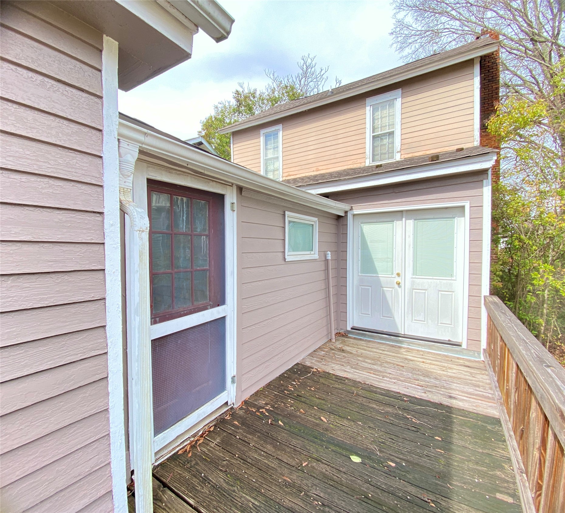 108 West Liberty Street Washington, GA 30673 - Photo 22 of 24 a view of house with backyard and wooden fence