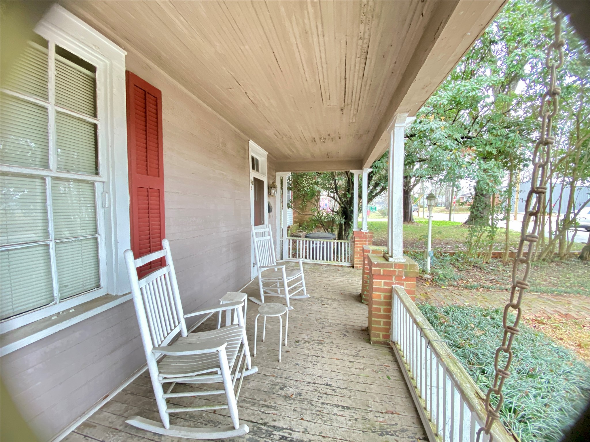 108 West Liberty Street Washington, GA 30673 - Photo 8 of 24 a balcony with chairs