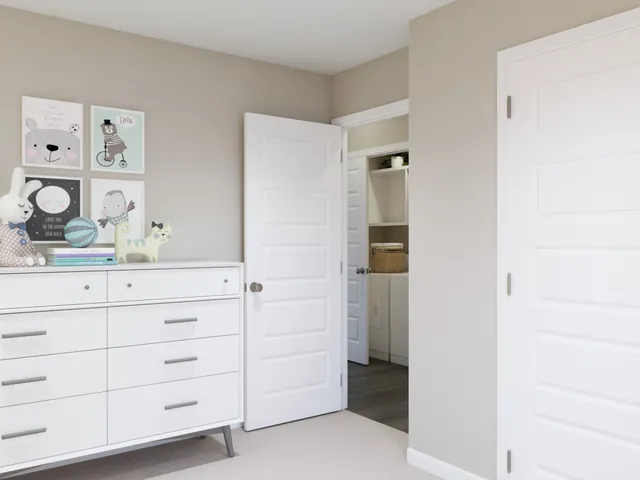 an aerial view of a house with garden space and swimming pool