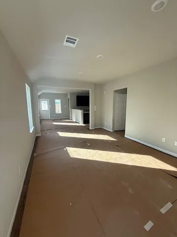 a view of a kitchen with a sink and dishwasher