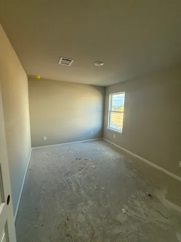 a view of empty room with window